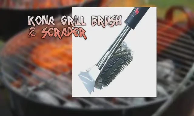 The Kona Grill Brush and Scraper being used on a grill grate.