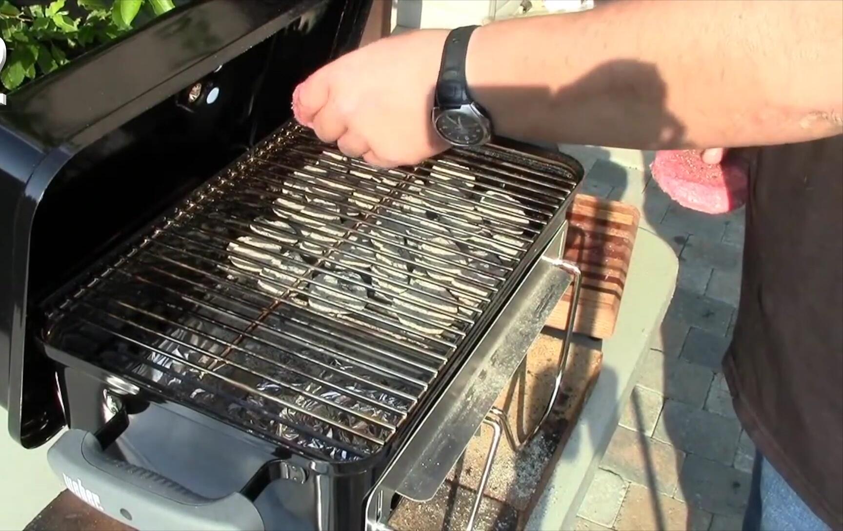 Weber Go-Anywhere Grill showing the locking lid