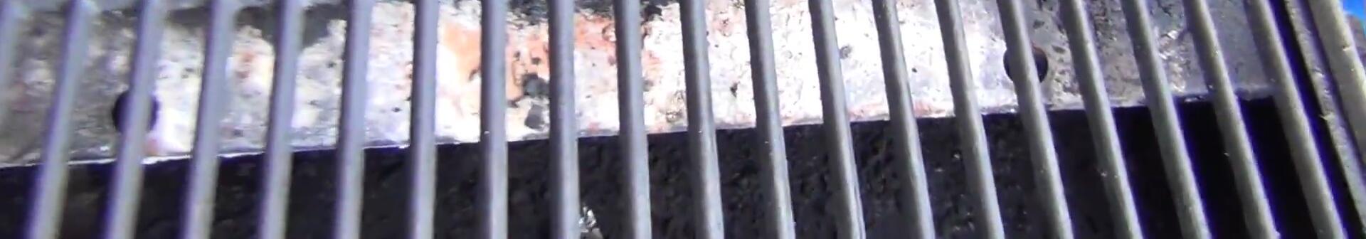 A shot of the dirty grill before the cleaning process.