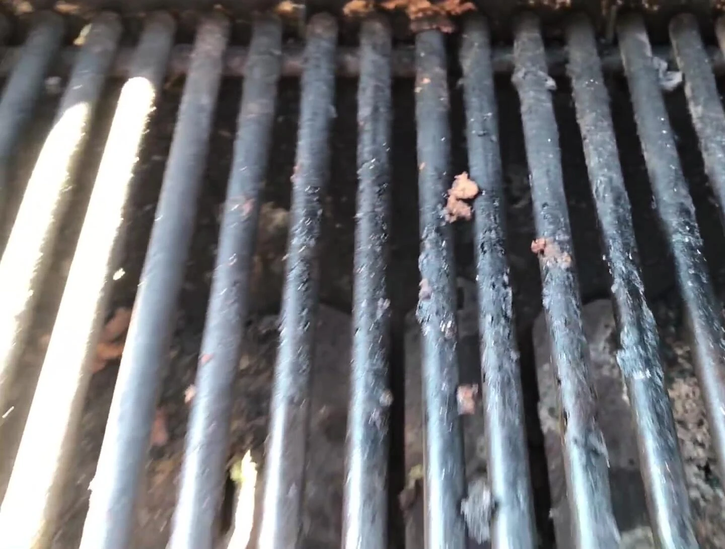 The grill at high temperature ready for cleaning