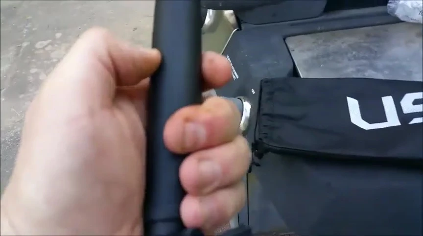 The handle of the grill brush showcasing the high impact plastic material.