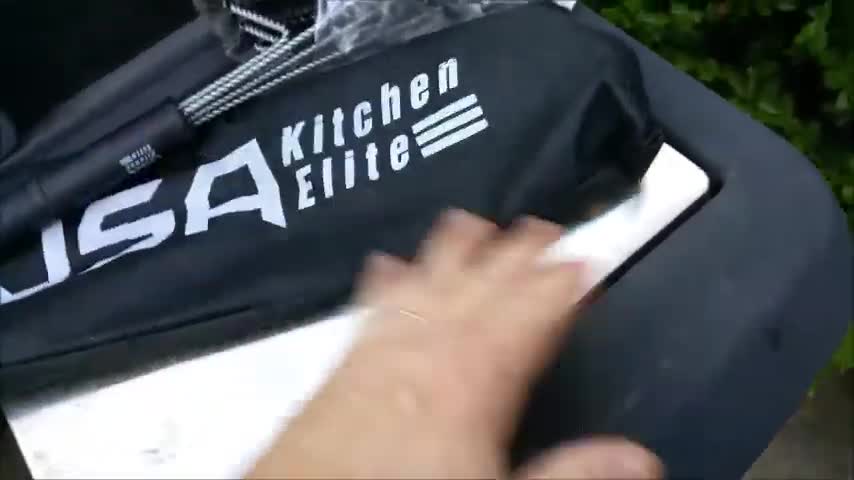 Close-up of the USA Kitchen Elite Grill Brush in its drawstring bag.