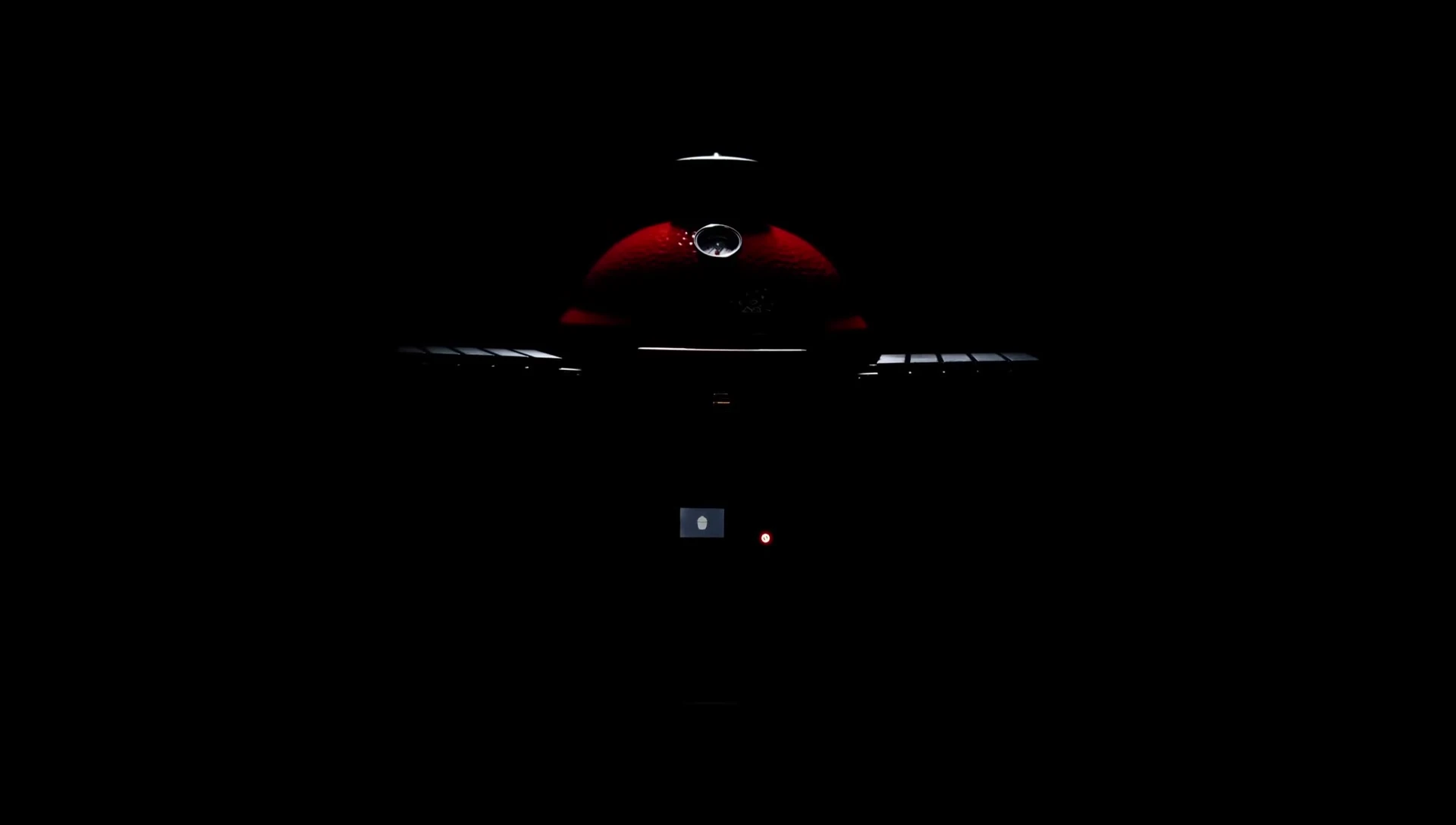 The ceramic body of the Kamado Joe, emphasizing its heat retention properties.