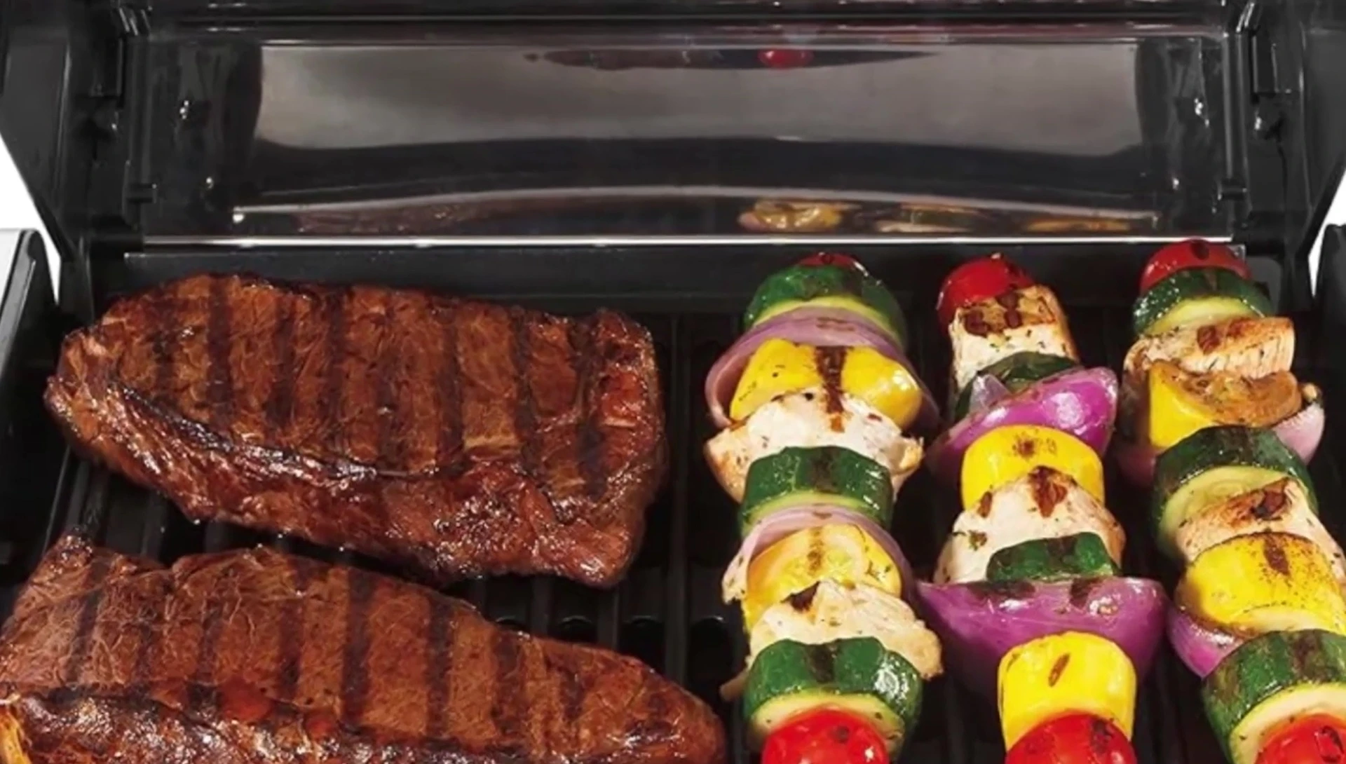 Close-up on the non-stick grill plates and built-in window.