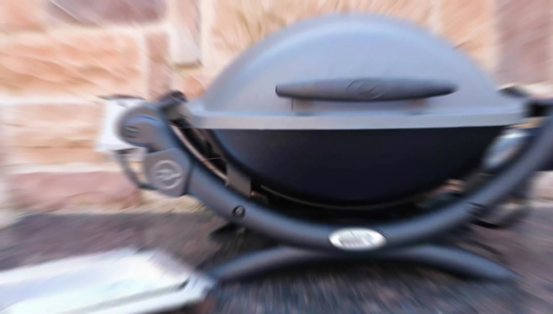 Weber Q400 electric grill, showing its portability.