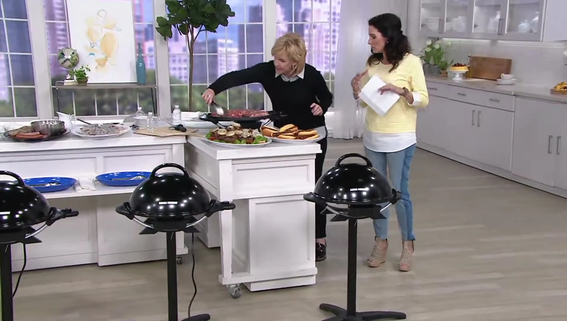 The grill with perfectly cooked steaks.