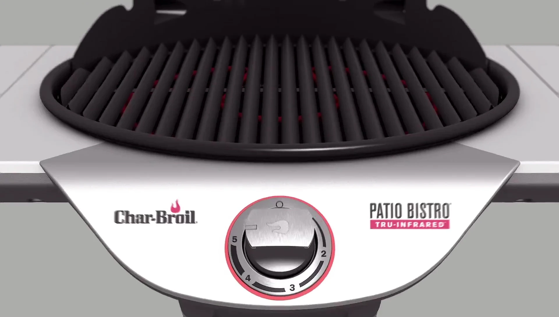 Close-up of the grill grates with food cooking