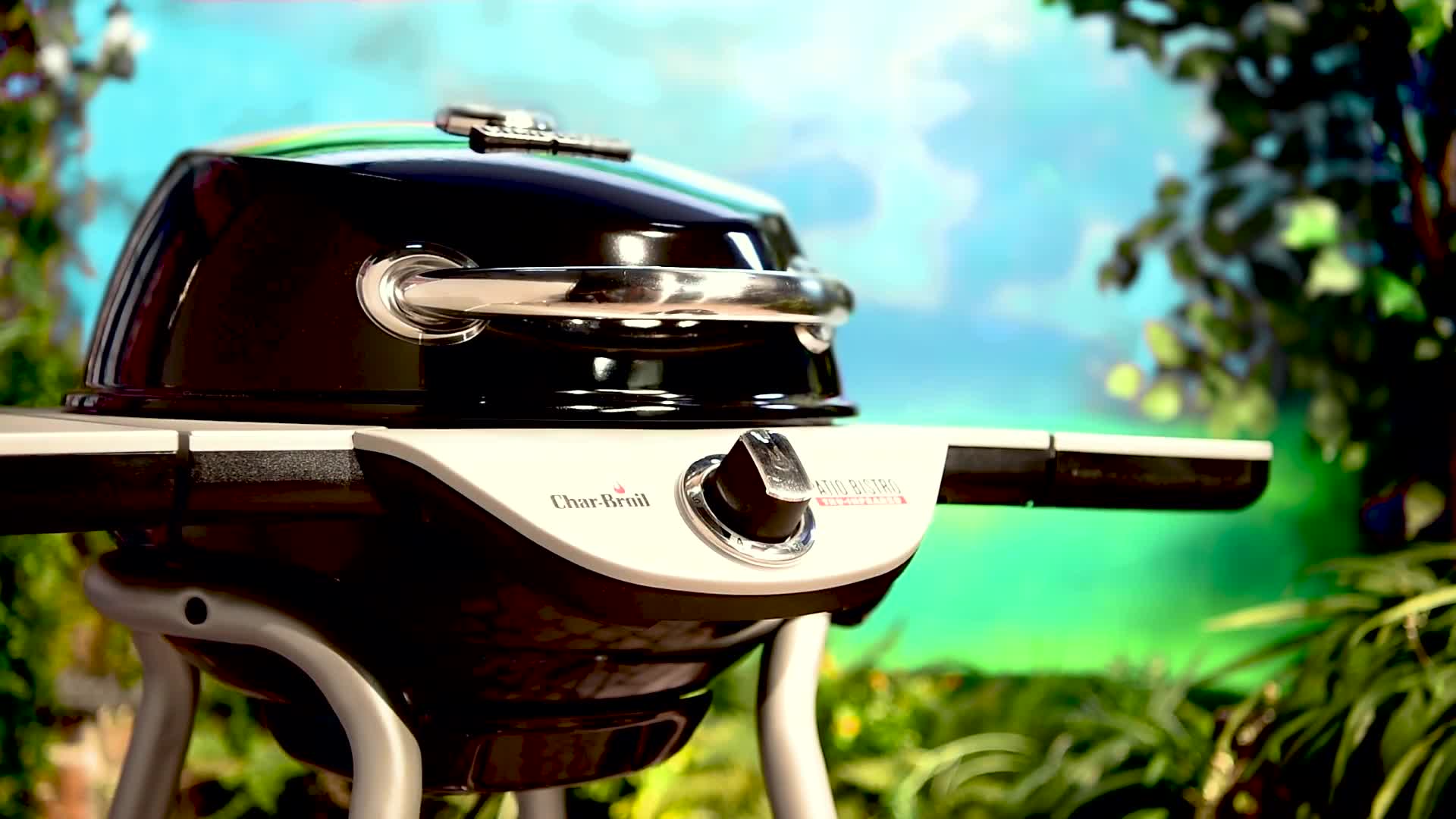 The Char-Broil Patio Bistro Electric Grill shown on a patio