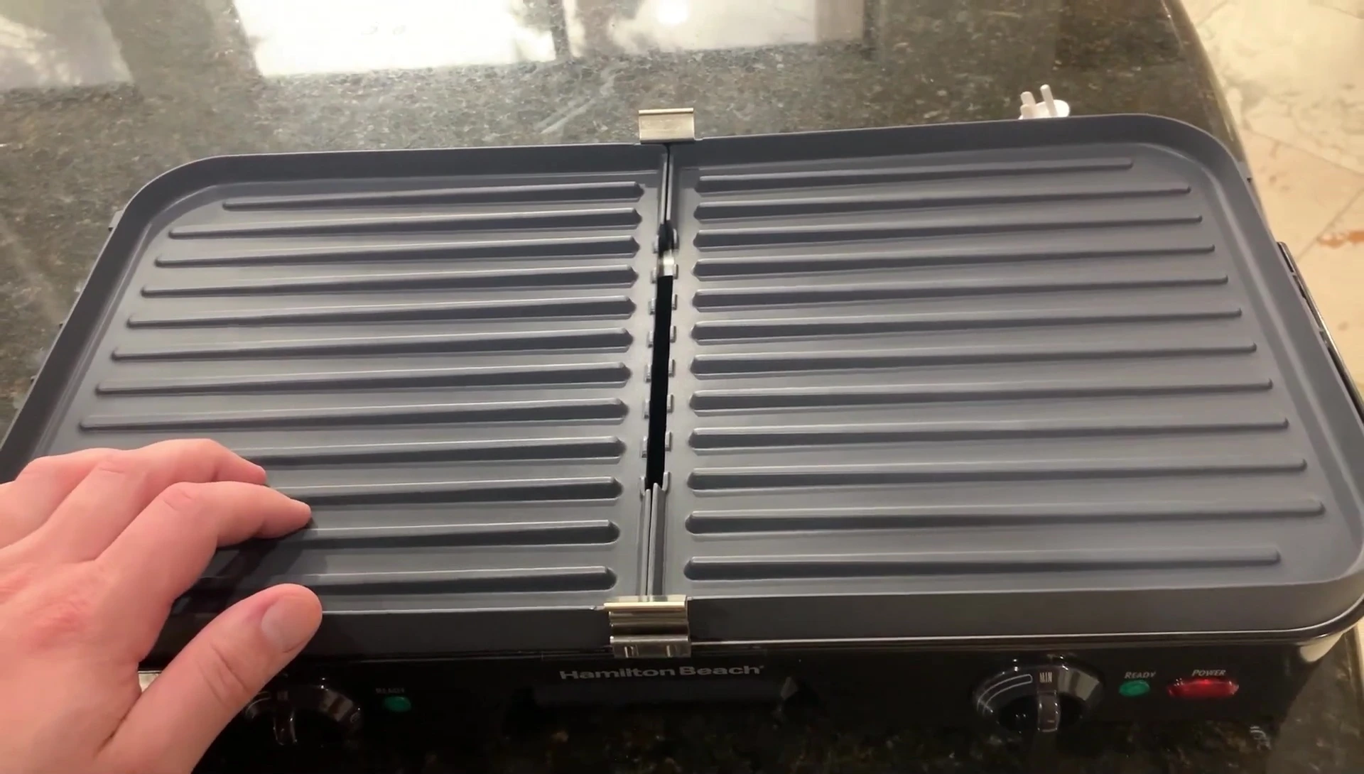 The griddle side of the appliance after the plates have been swapped