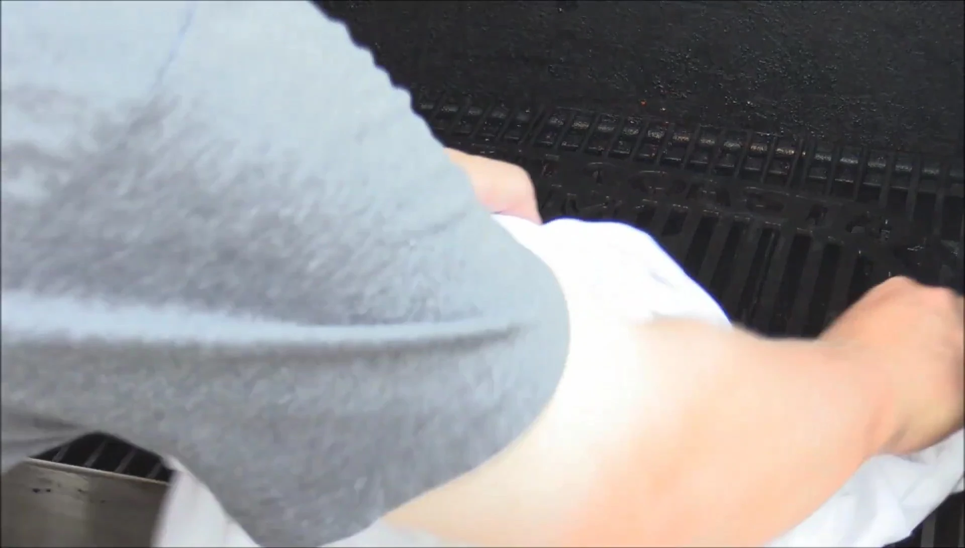 Wiping off excess oil with a cloth