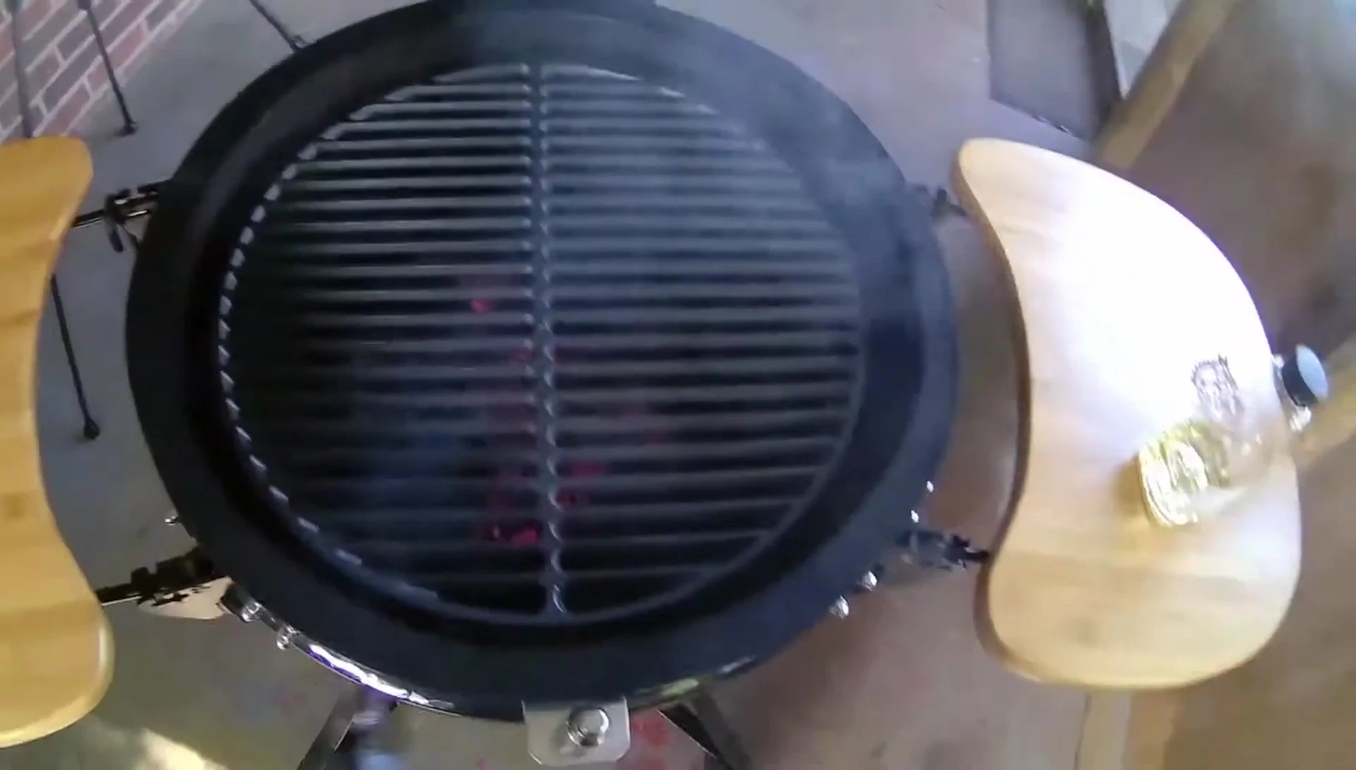 Close-up of the grate's fit within the grill.
