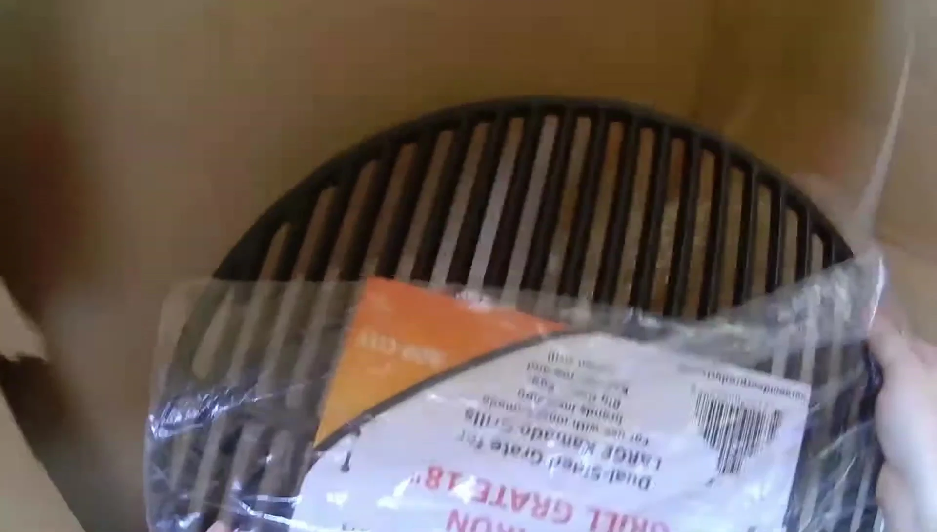 Close-up of the heavy package being held.