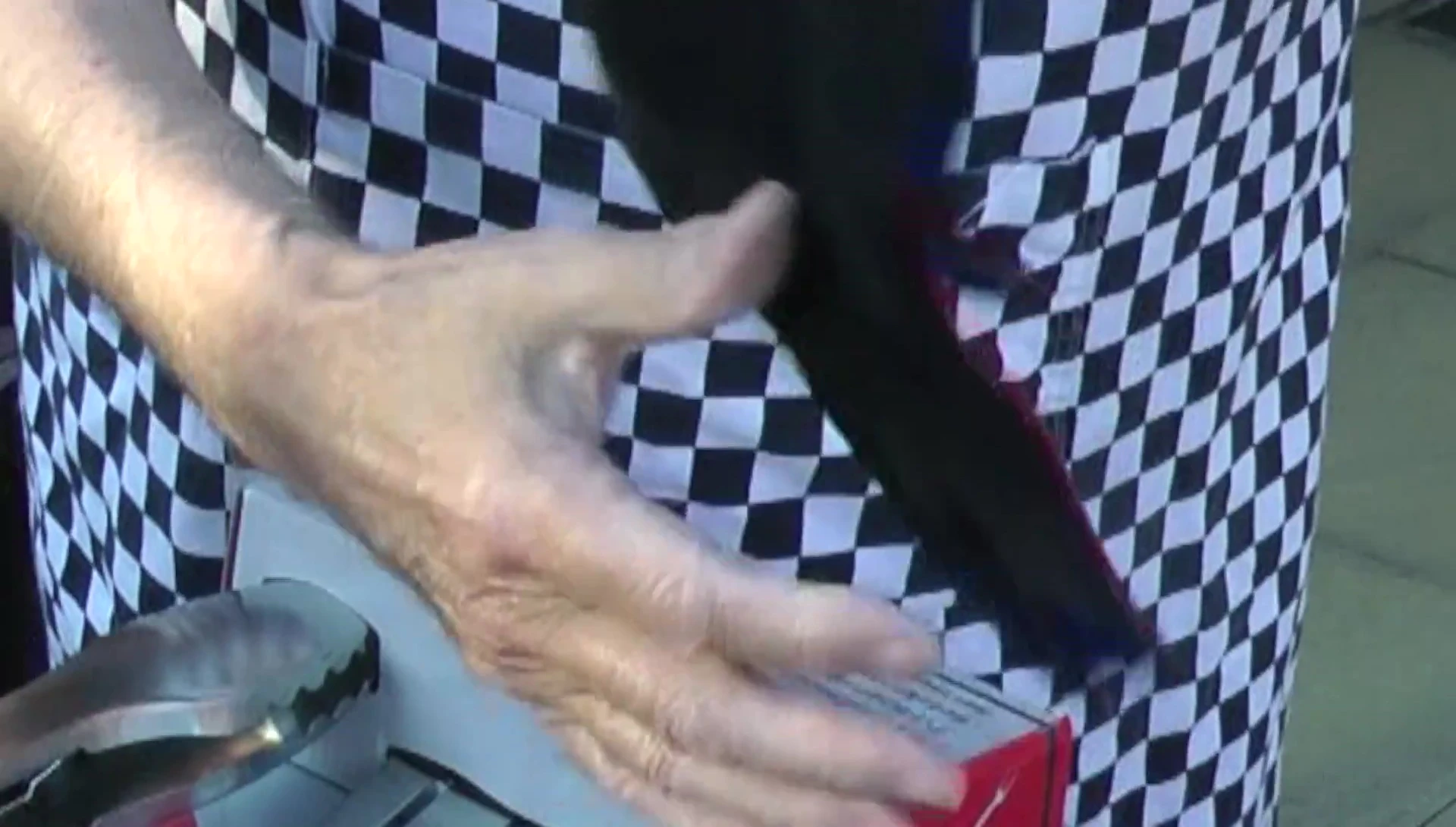 The Weber leather barbecue gloves shown with hanging loop.