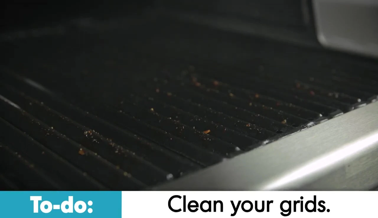 Cleaning grates with a stainless steel brush