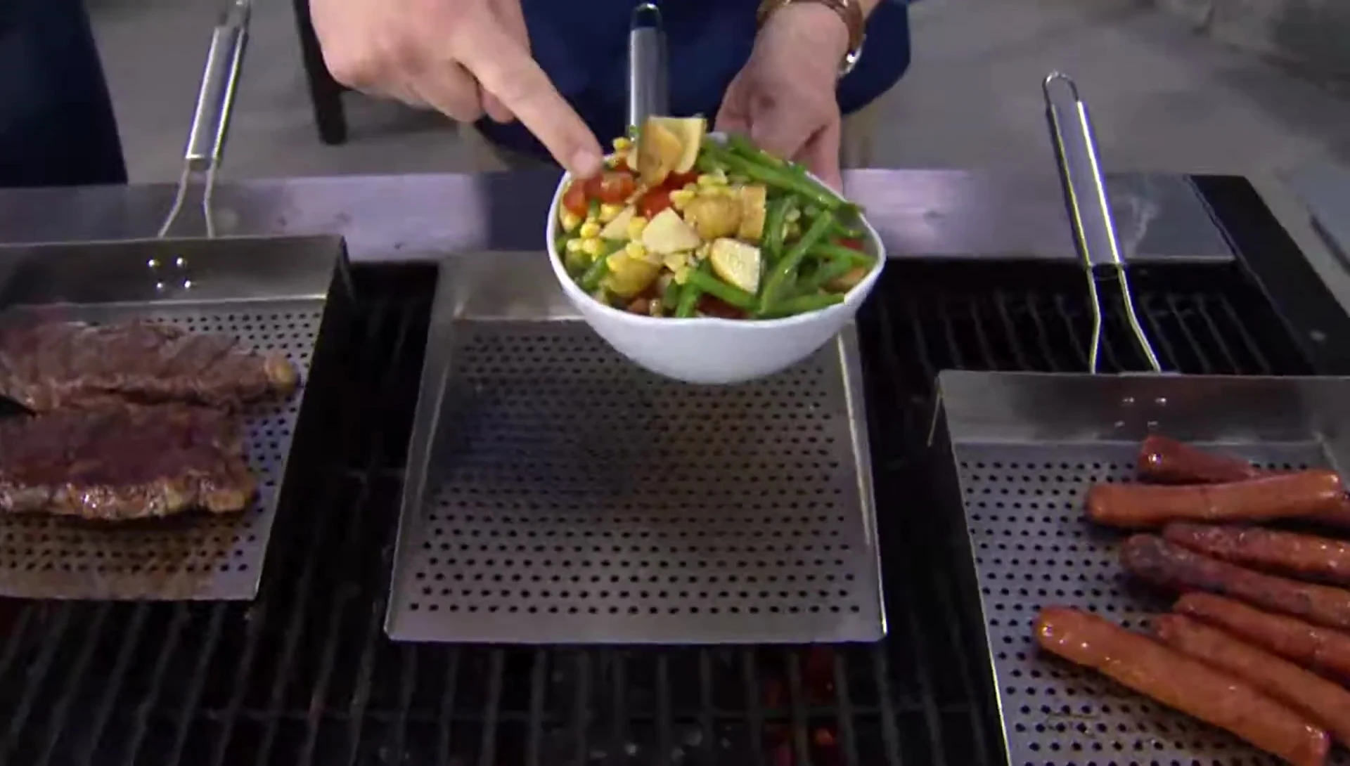 Various vegetables cooking on the grill plate.