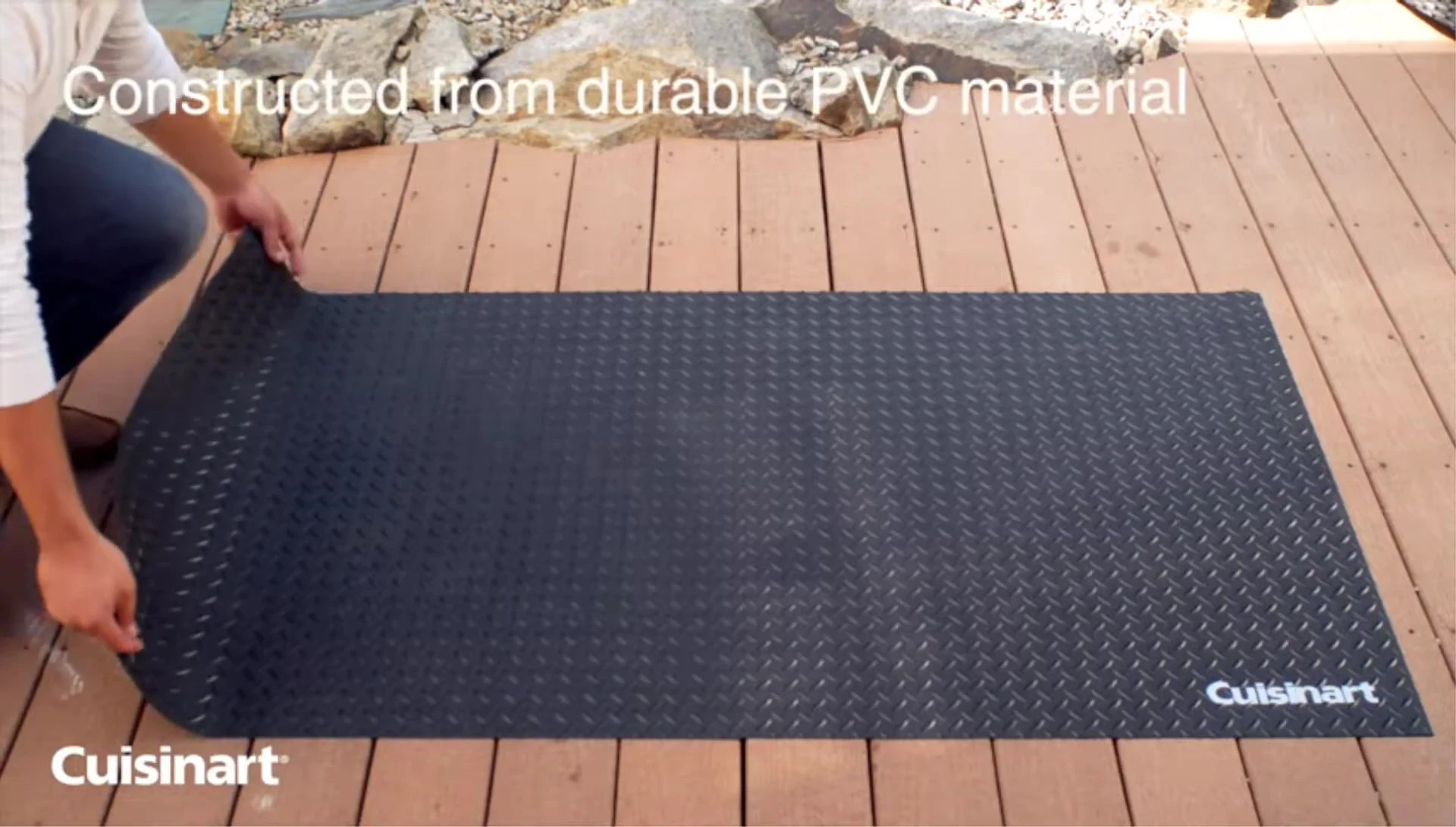 The Q Icon grill mat in use on a patio