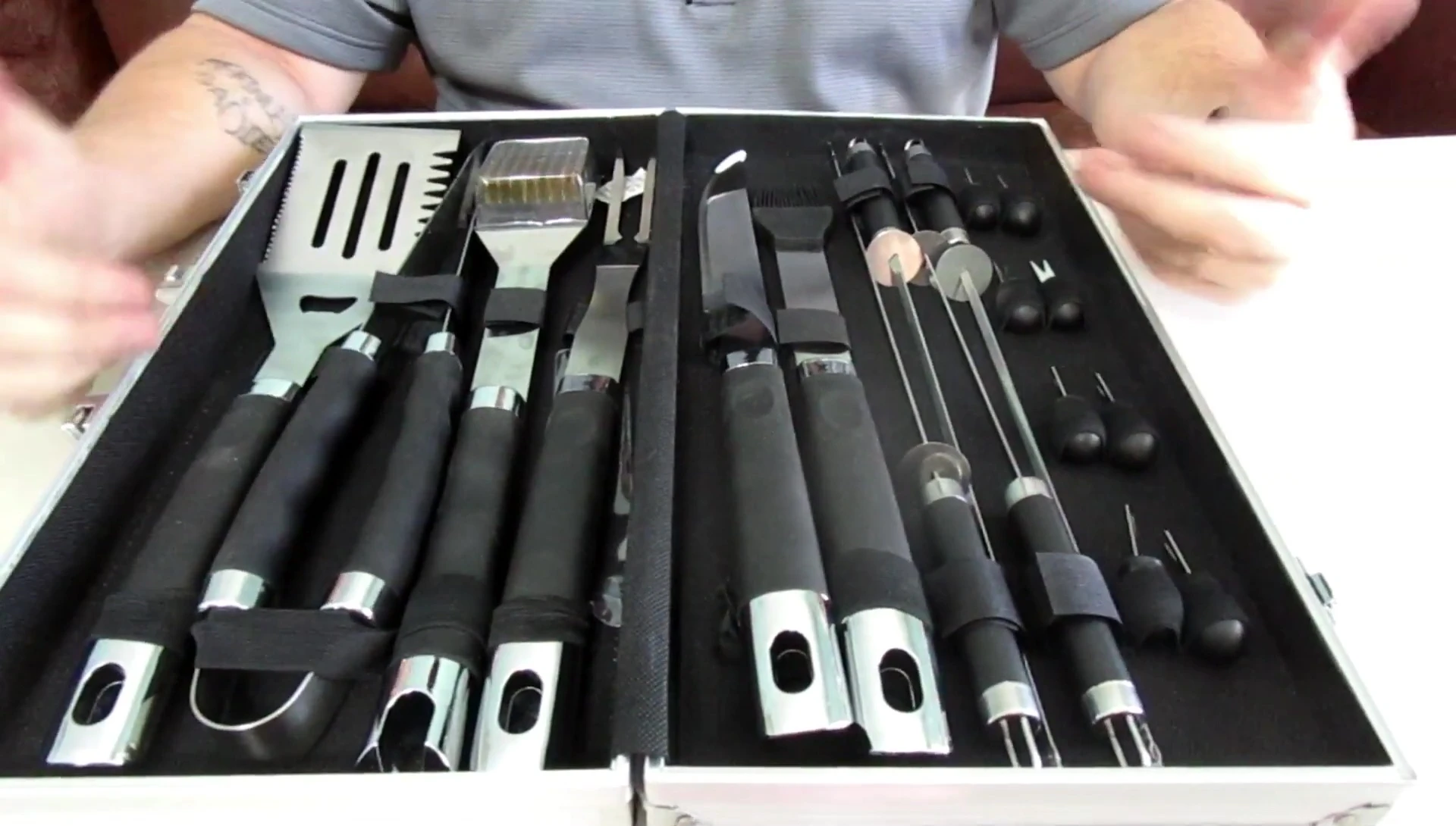The reviewer demonstrating use of a tool.