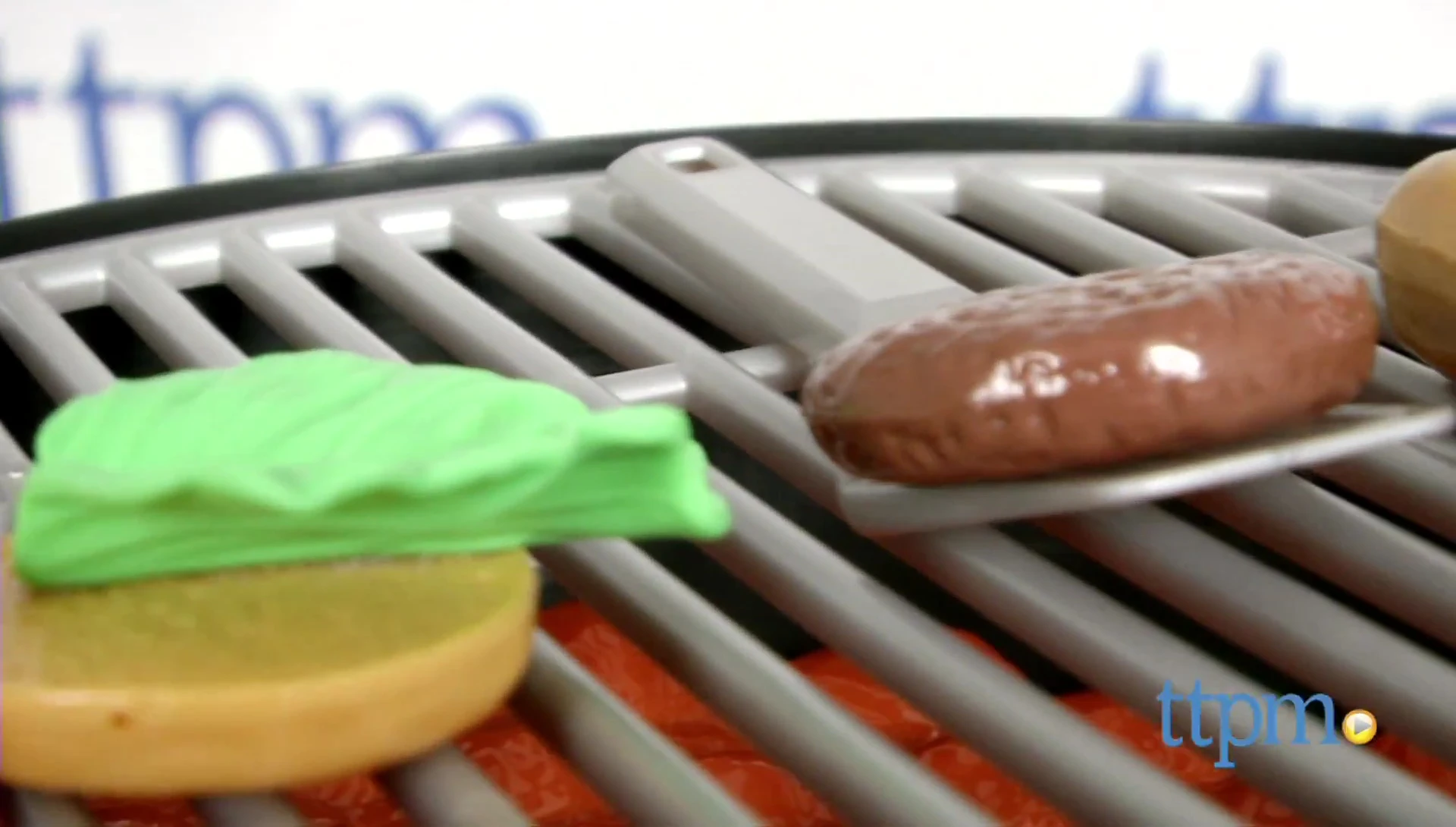 Child playing with the grill