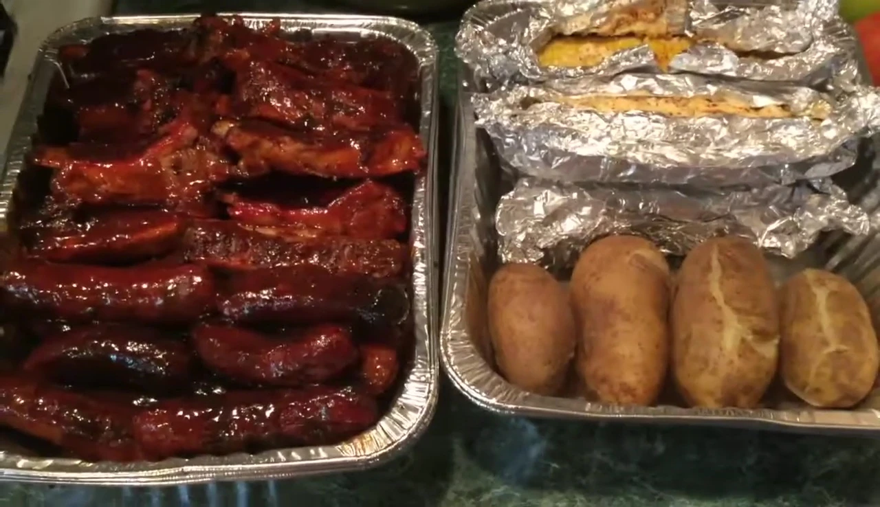 Finished meal: ribs, street corn, and potatoes