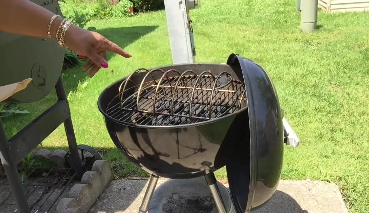 Arranging charcoal in the Weber Kettle Grill