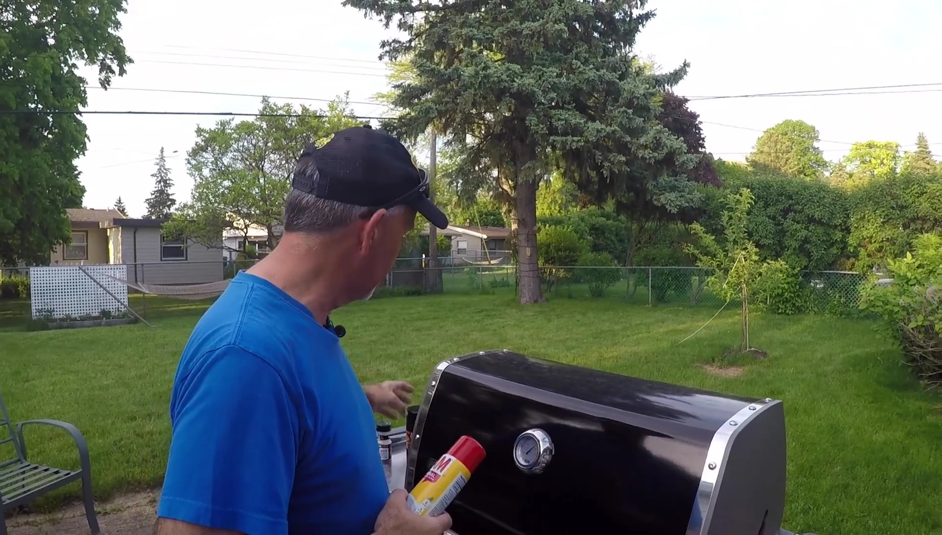 Close-up shot of the grill grates being prepared.
