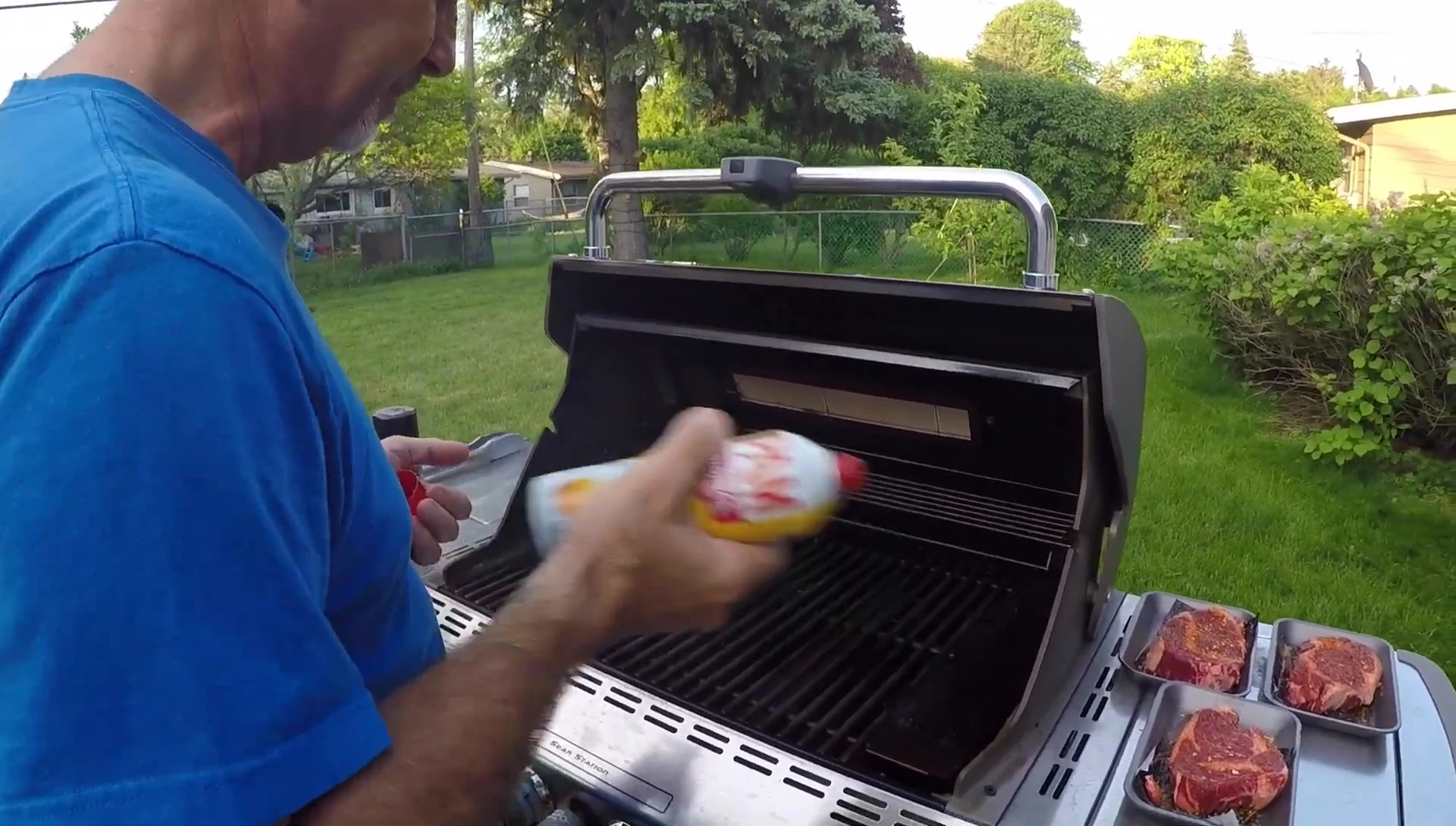 Pam spraying onto grill, flames erupting.