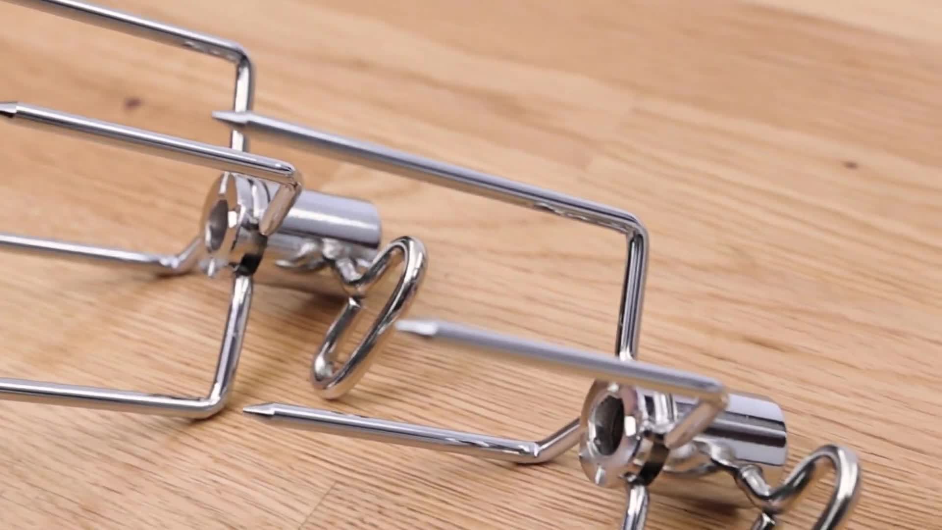 Close-up of the standard Broil King rotisserie forks