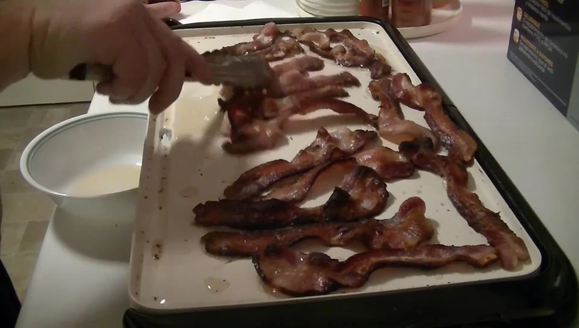Close-up shot showing the even cooking and browning of the bacon.