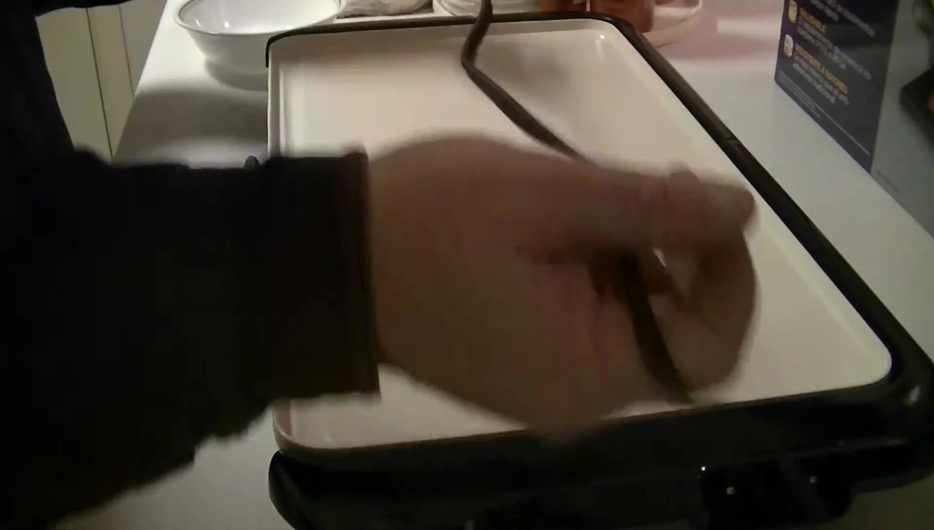 Close-up shot of the DuraCeramic griddle's power cord and control panel.