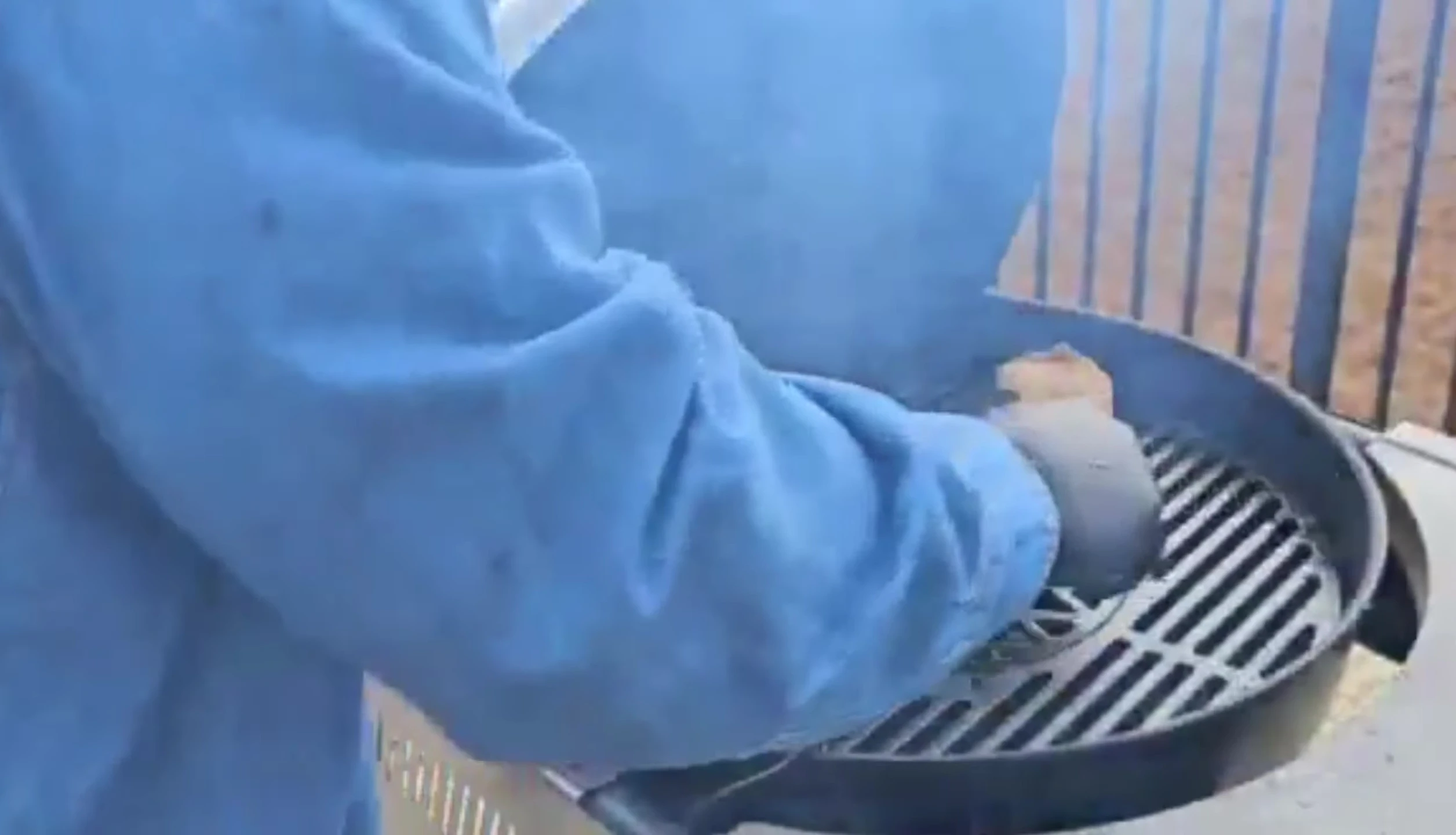 Searing the steaks over direct heat.