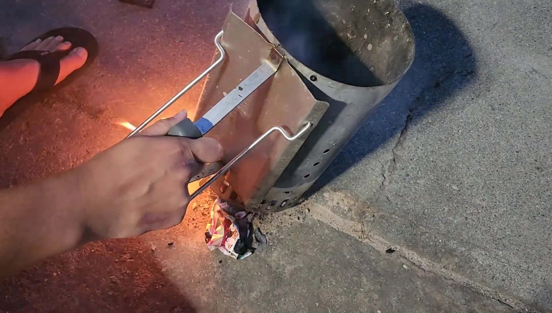 Briquettes burning in the charcoal chimney