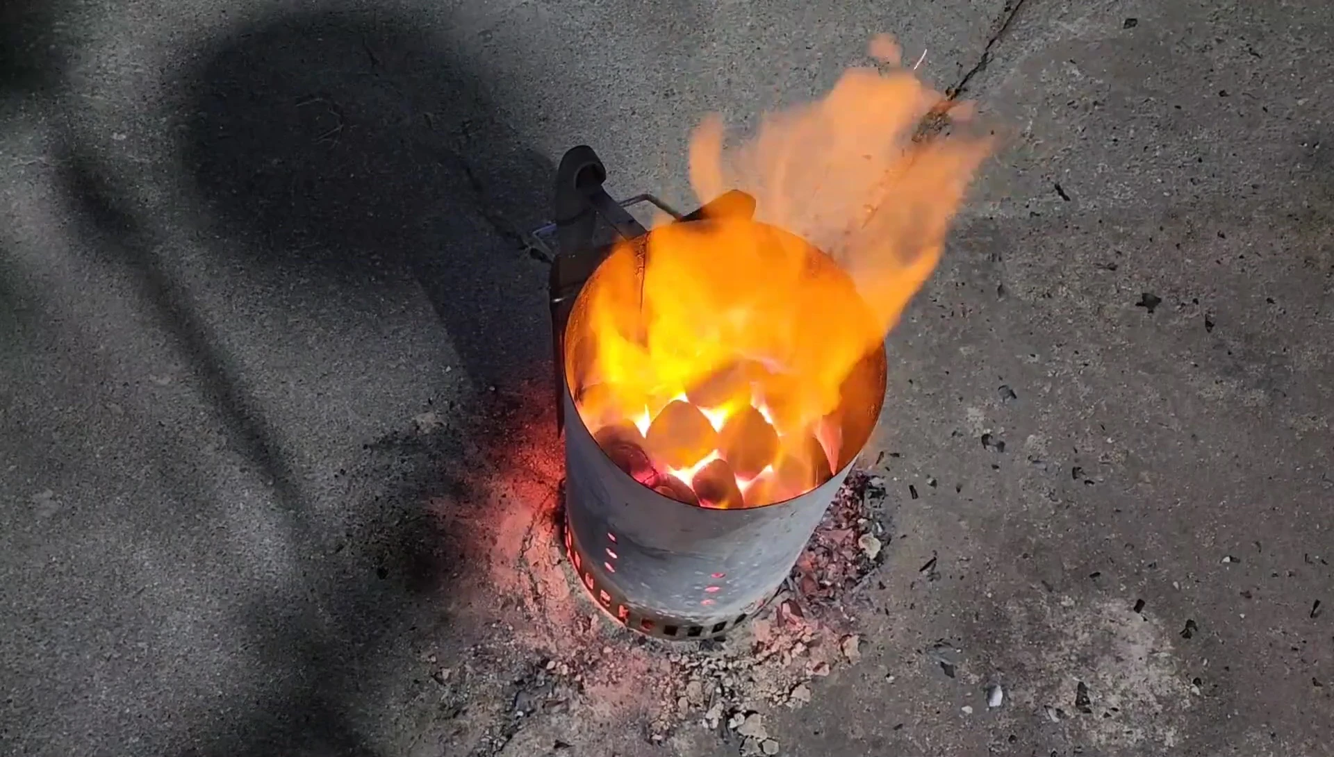 Hot flames from the charcoal chimney