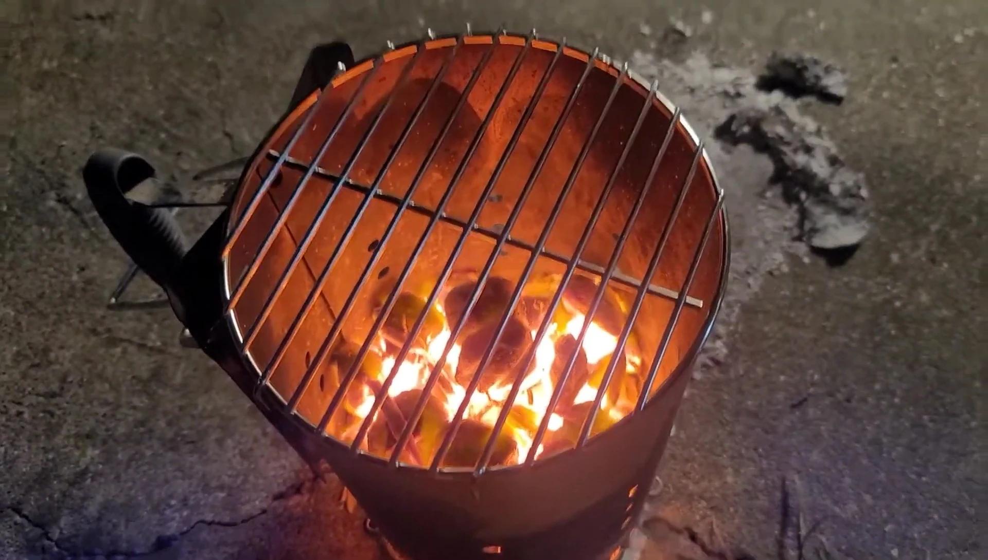 The hot coals in the chimney starter ready for searing.