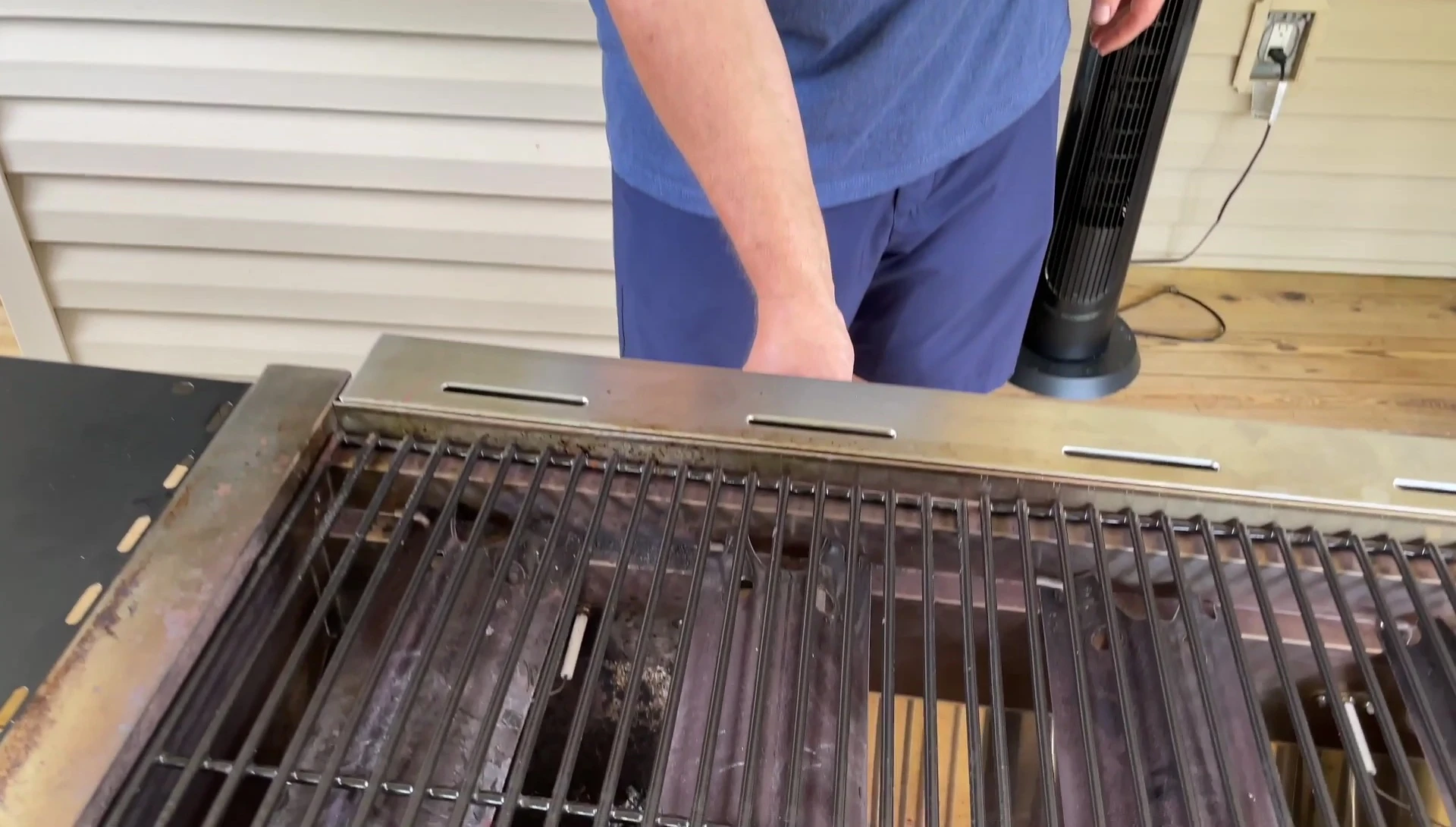 Close-up of the Camp Chef flat top grill being turned on
