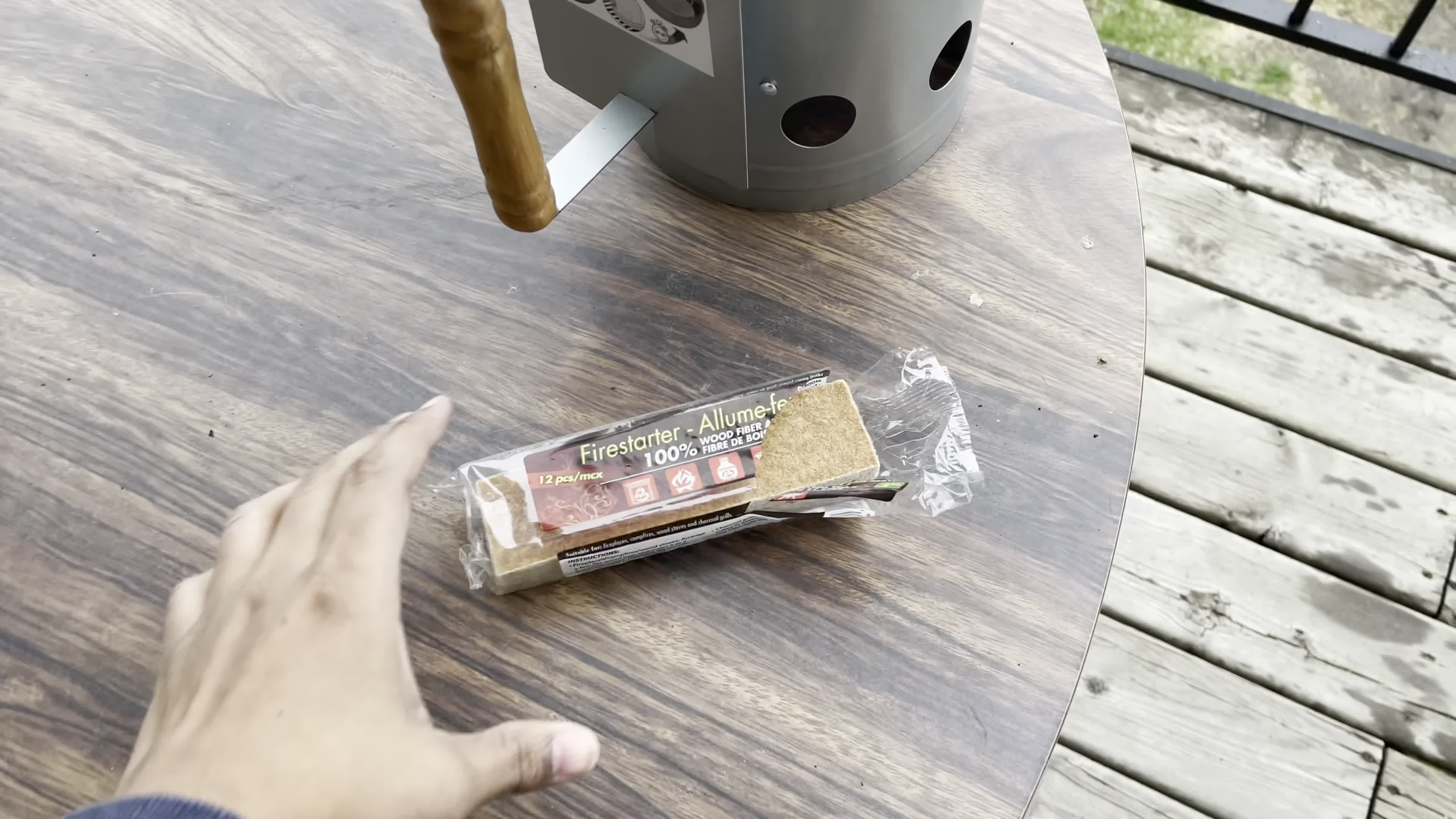 The dollar store fire starter being used.