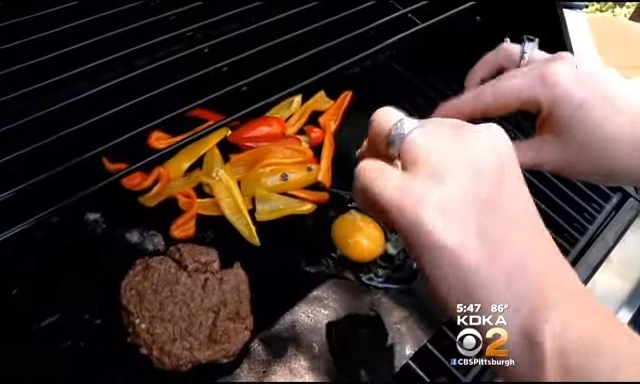 The cooked egg on the grill mat