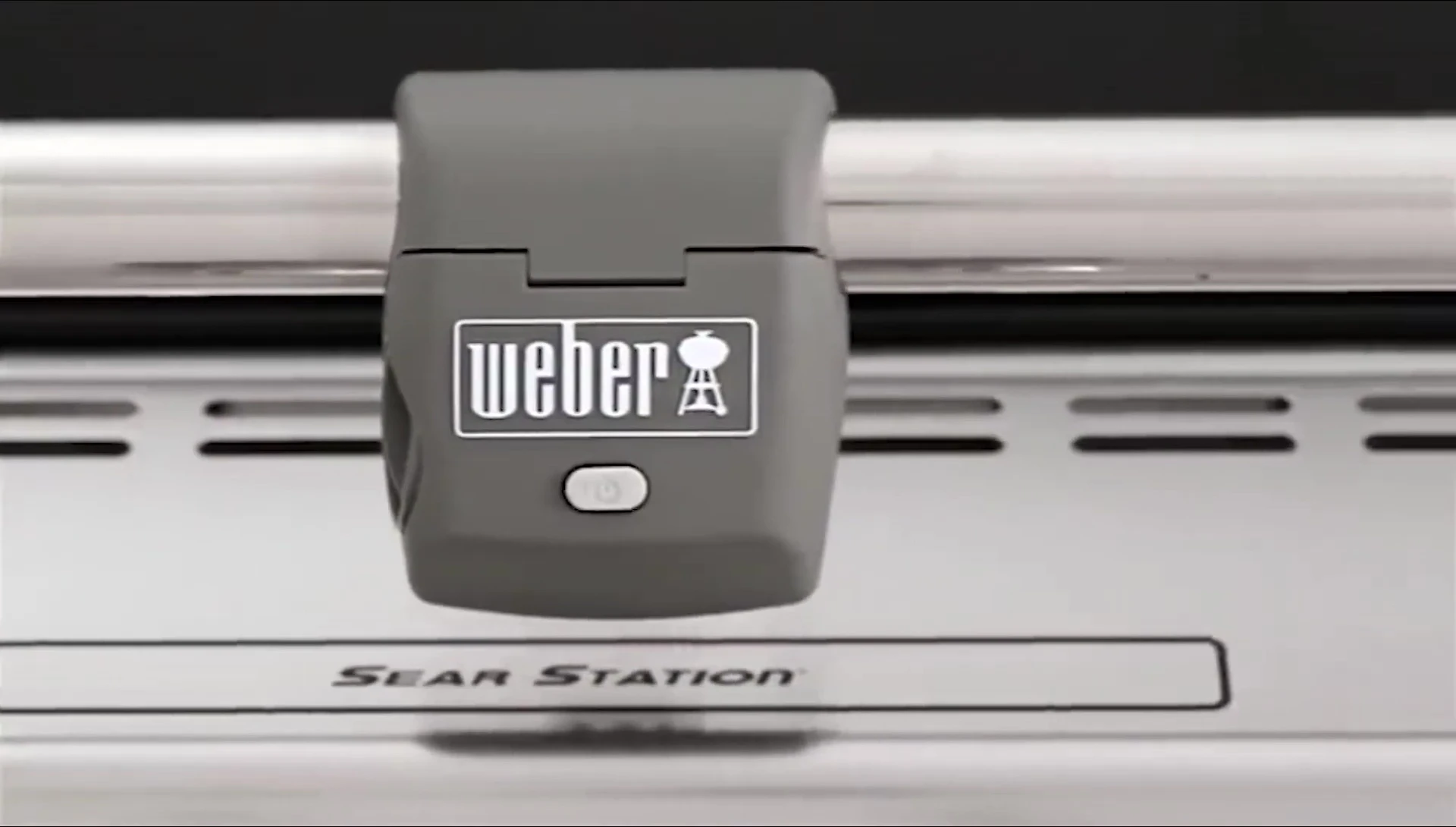 Detailed shot of the Weber Summit E-470's control panel and burners