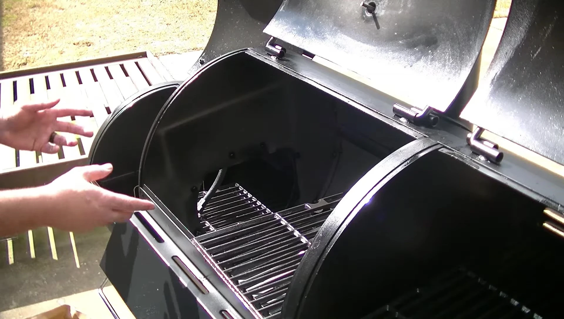 Adding charcoal to both pans