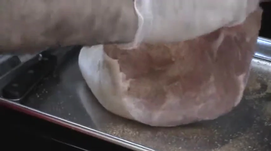 Inspecting the seasoned shoulder.
