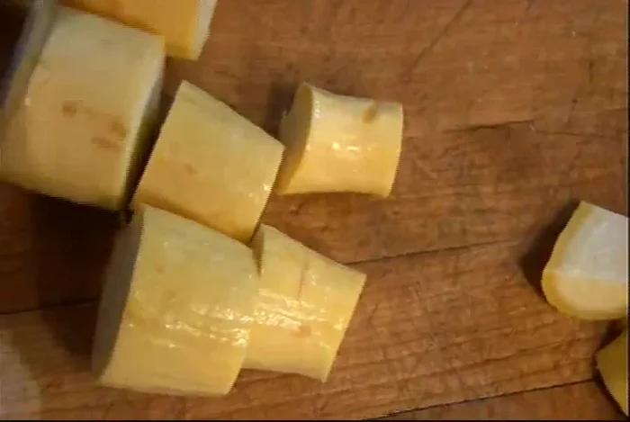 Prepare the other vegetables: Cut yellow zucchini into thick rounds (3 small zucchini), cut two yellow bell peppers in half, remove seeds and membranes, then cut into chunks, and chop one yellow onion into large chunks.