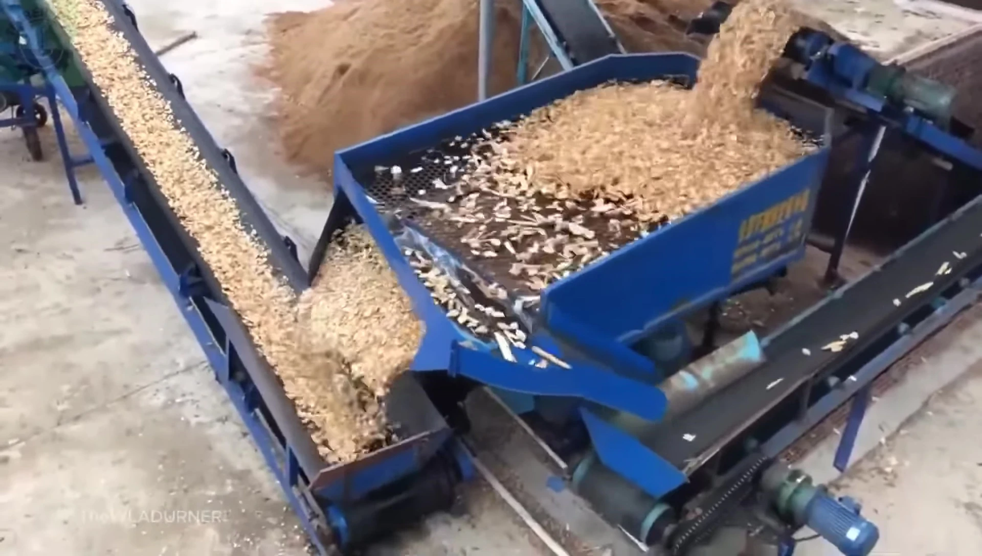 The vibrating screener in action.