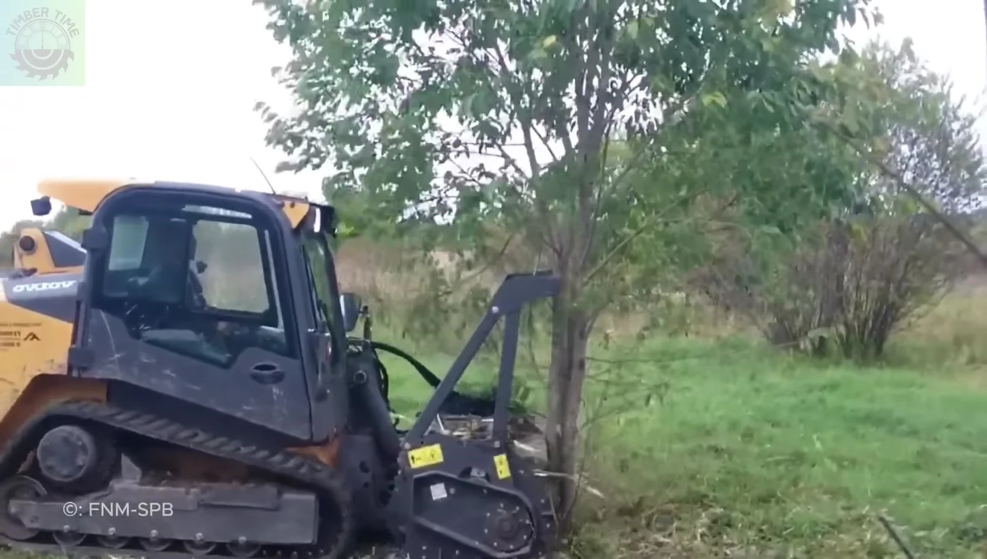 The Volvo MC T110C paired with a brush cutter.