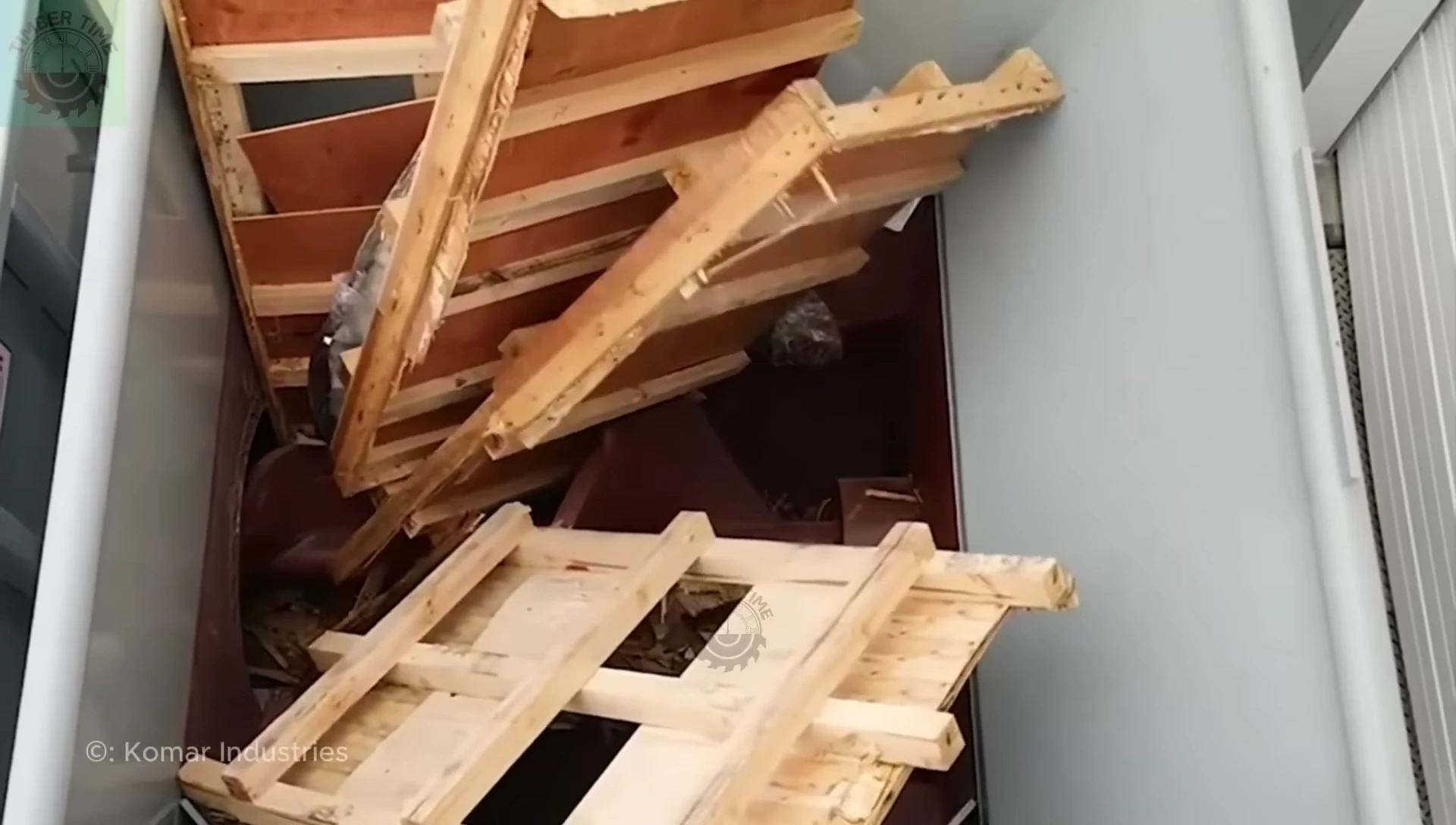 The wood shredder efficiently processing pallets.