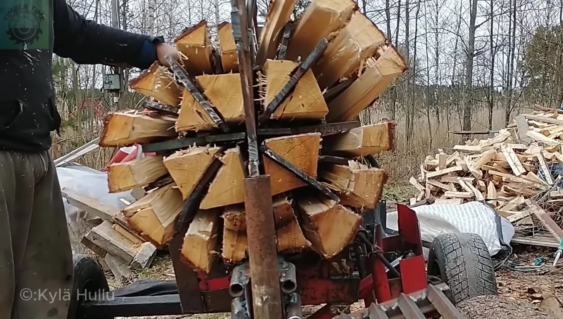 The homemade wood splitter in action.