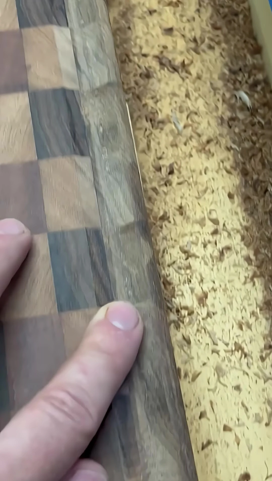 The woodworker attempts to repair the damage by adding another blocker and adjusting the juice screw.