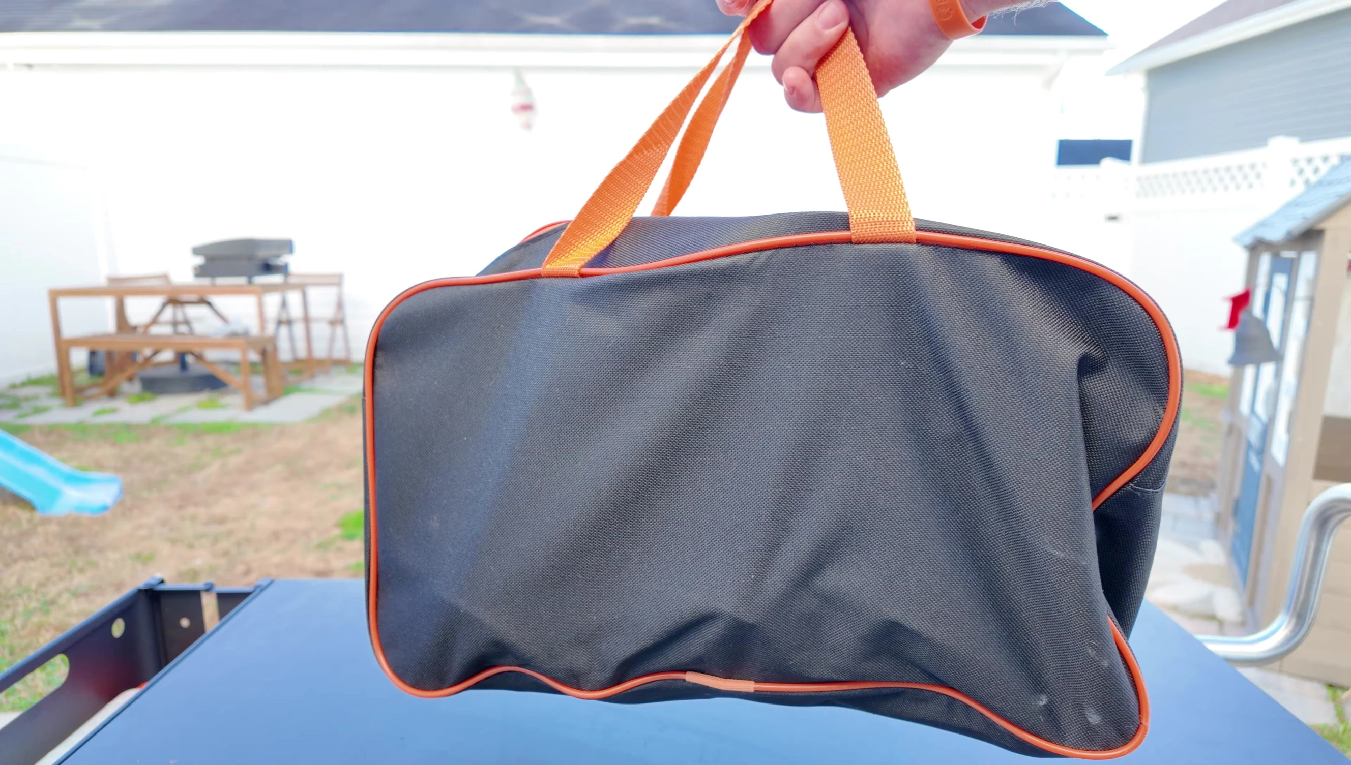 The carrying case with all the accessories neatly organized.