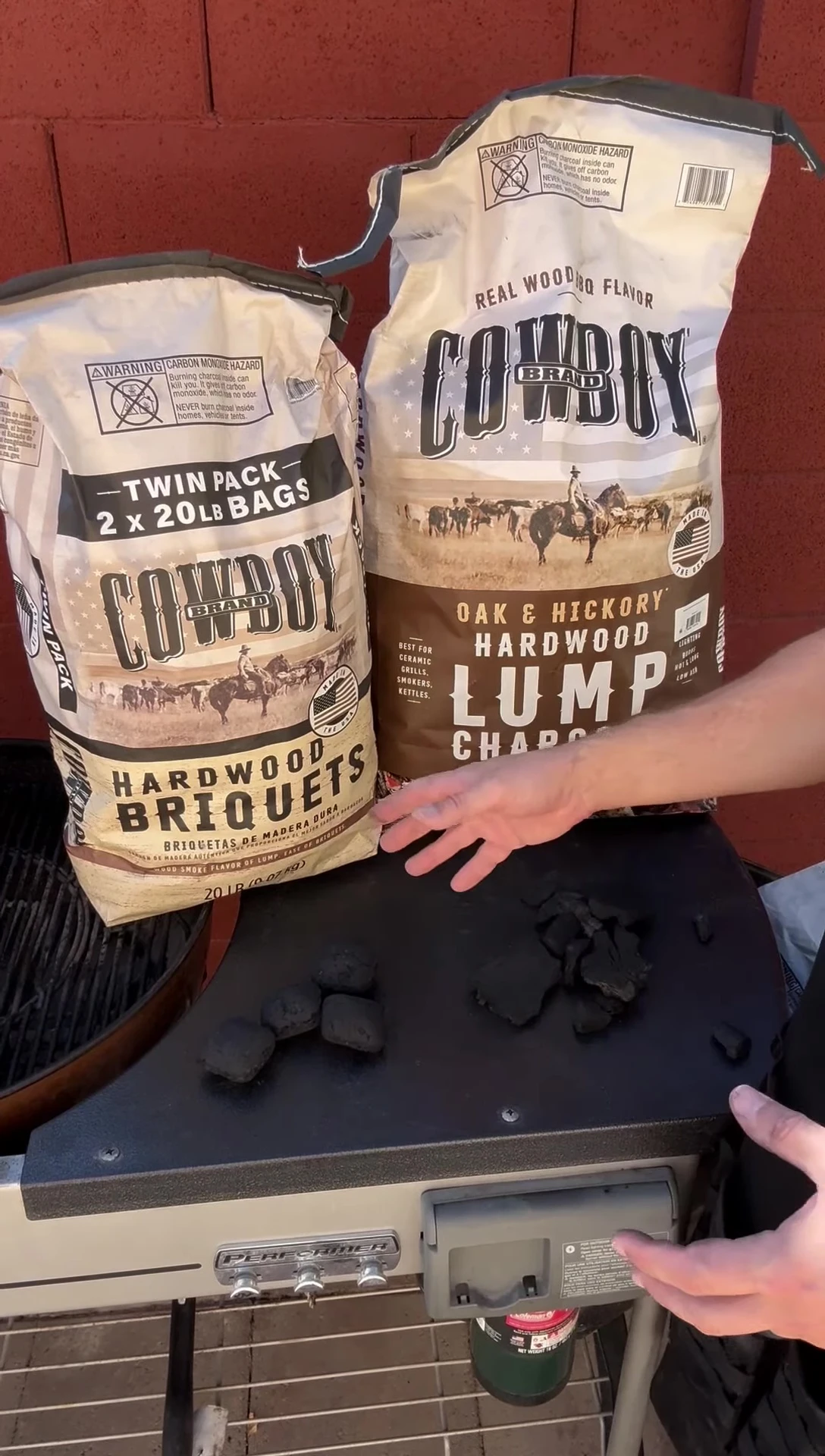Briquettes burning steadily in a grill, suggesting their long burn time.