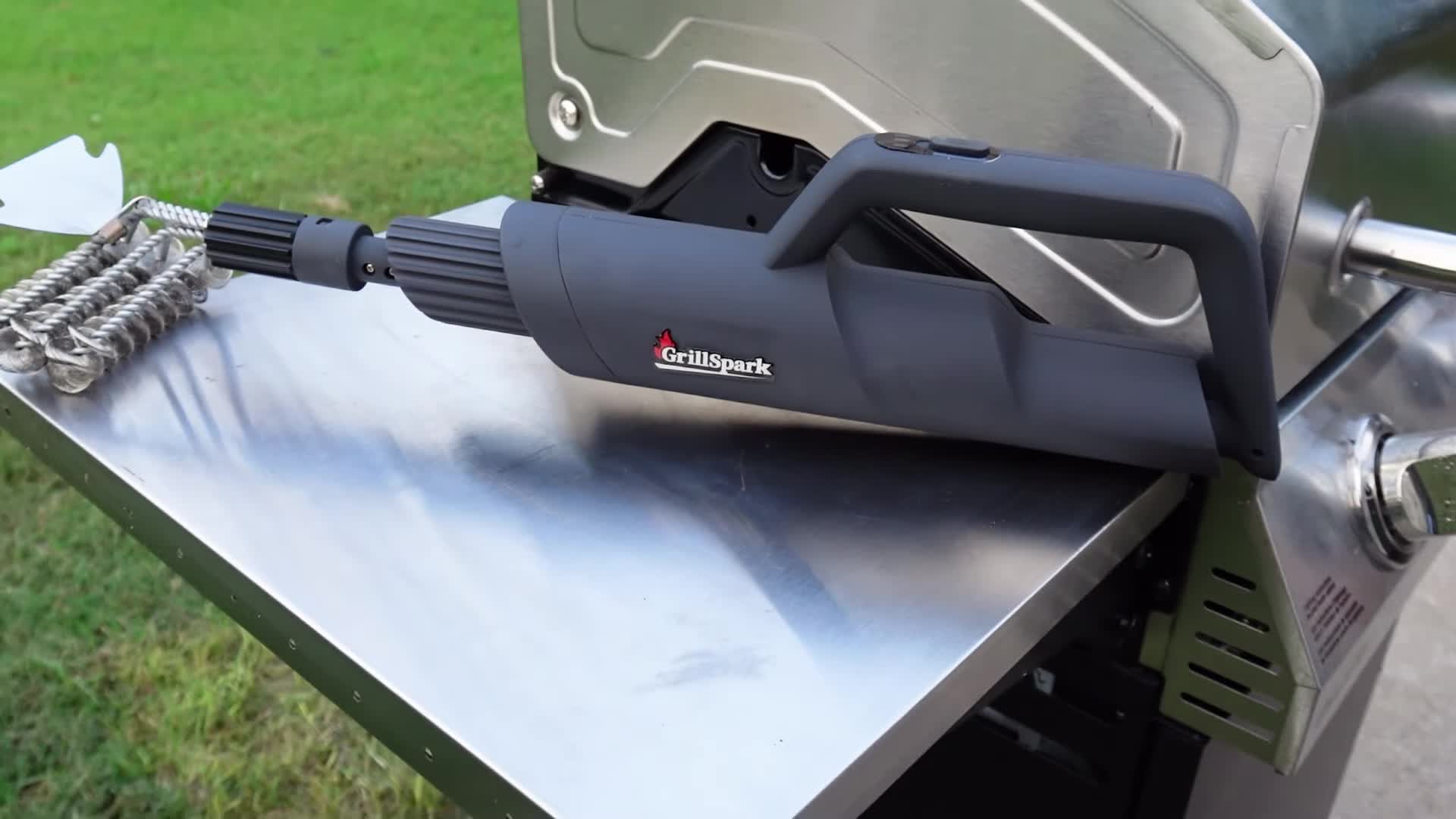 The GrillSpark G1 electric grill brush shown.