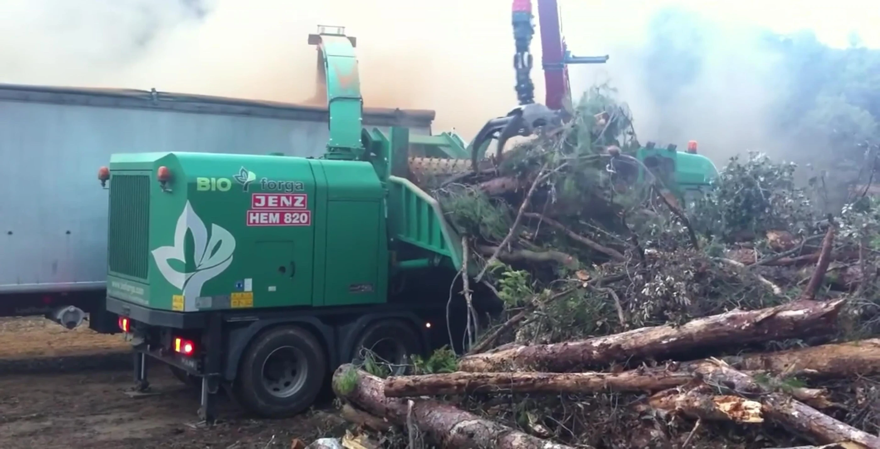 Bioforga HIM 820 chipper working on a pile of branches