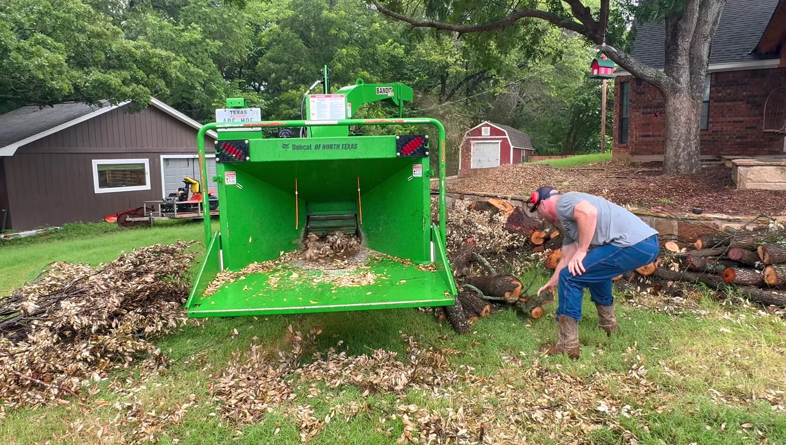 Demonstration of the Bandit 12XPC chipping a large log.